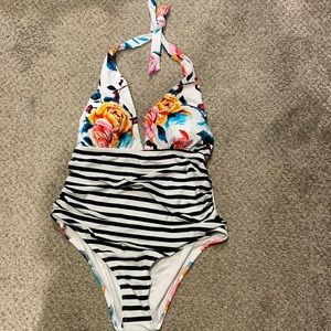 Brand new one piece halter bathing suit.
